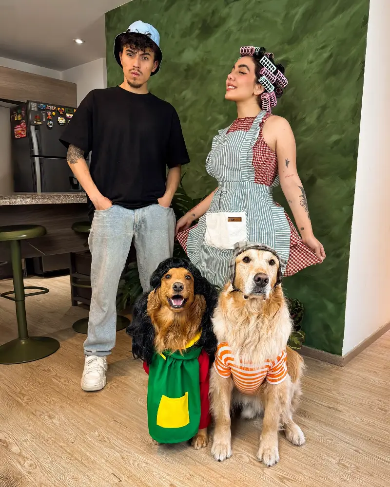 6. Retro Sitcom Couple Costume with Two Character-Dressed Golden Retrievers