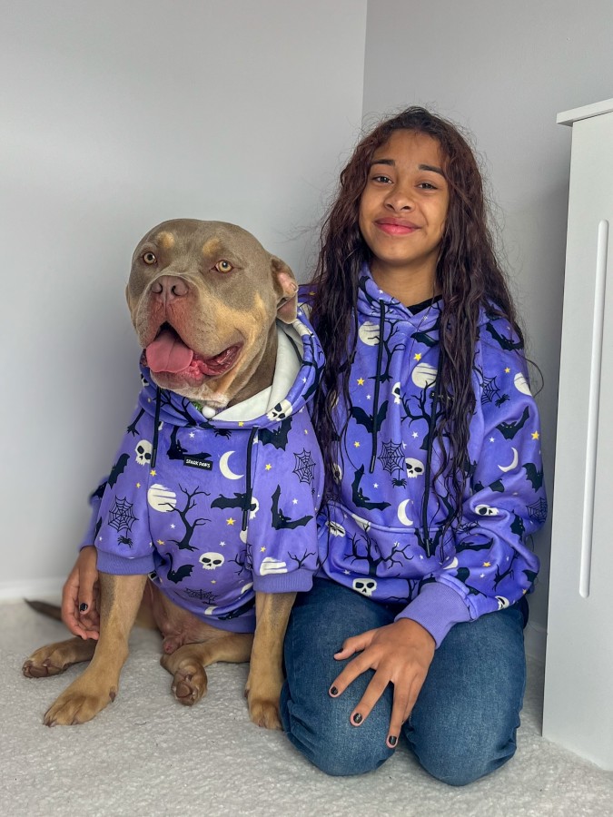 8. Matching Purple Spooky Pattern Hoodies on a Muscular Bully Breed