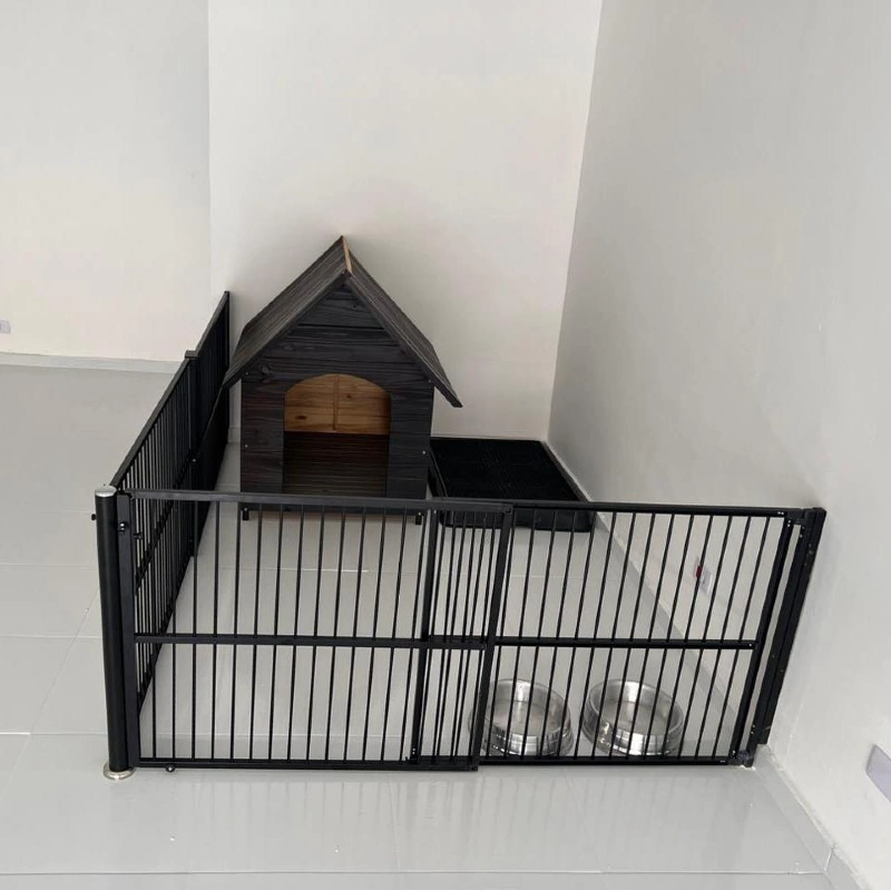 Black Metal Picket Enclosure with Dark Stained Wooden A-Frame Dog House