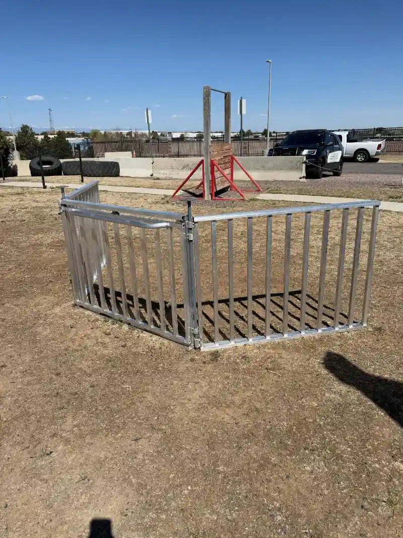 Galvanized Metal Slatted Freestanding Gate on Dry Grass