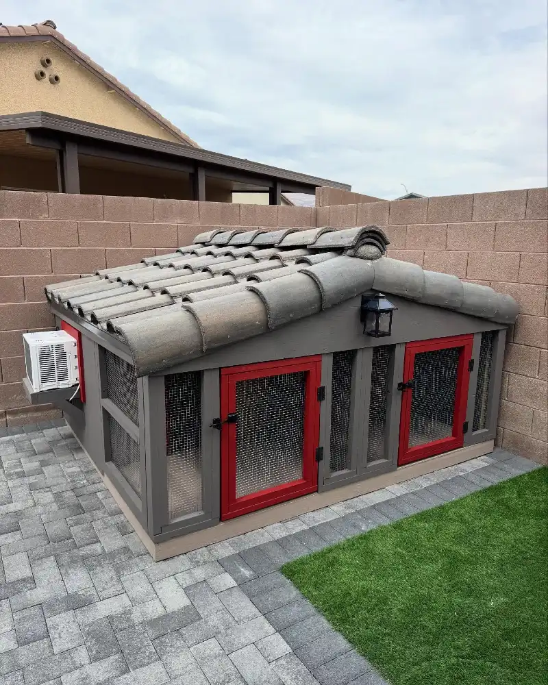 Gray Mesh Kennel with Crimson Doors and Barrel Tile Roof