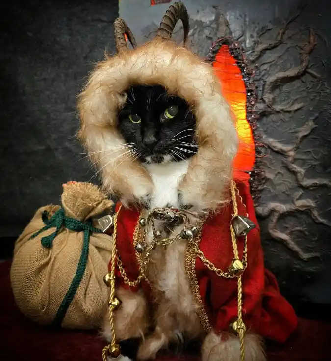 Krampus-Inspired Red Cloak with Fur Hood and Horns on a Tuxedo Cat