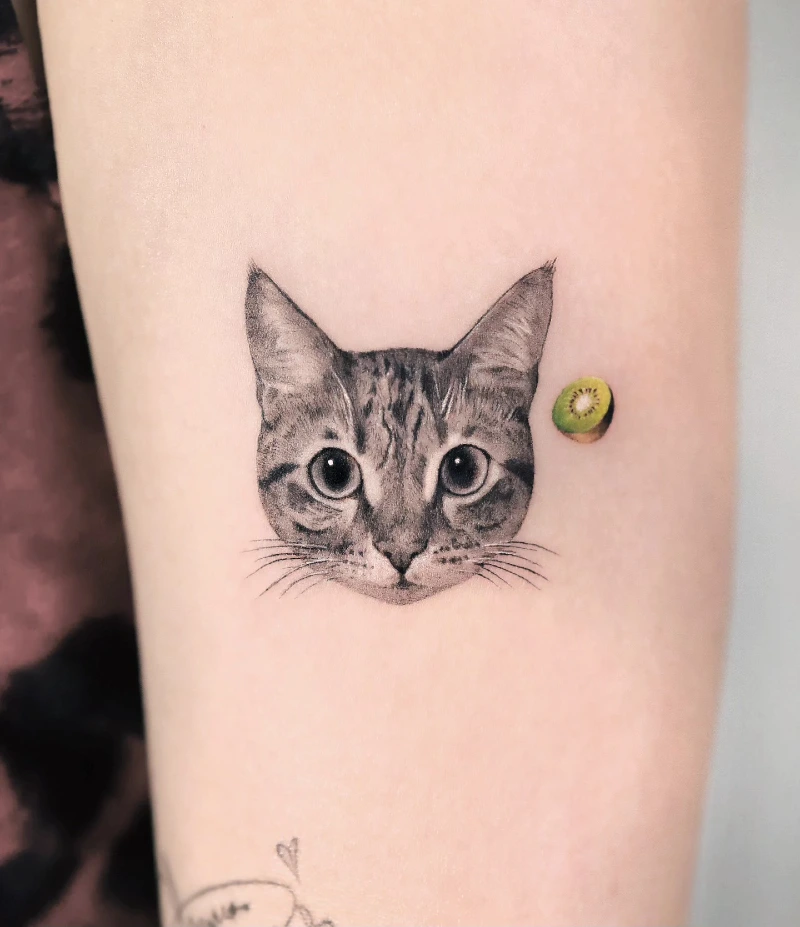 Micro-Realism Tabby Cat Portrait with Floating Kiwi Fruit Tattoo