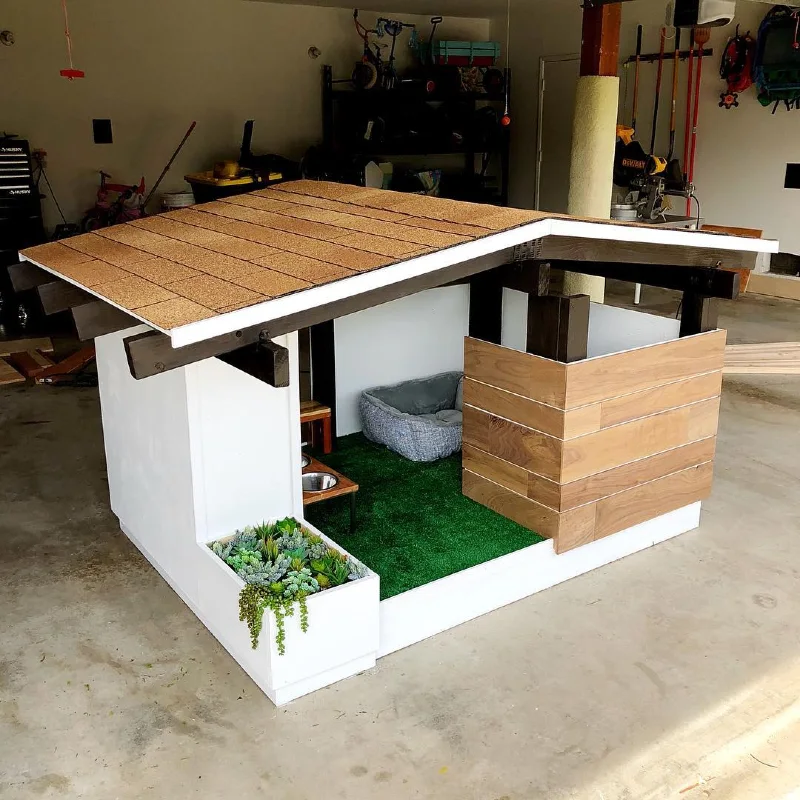 Mid-Century Modern Shelter with Low-Pitch Shingle Roof, Faux Grass Courtyard, and Succulent Planter