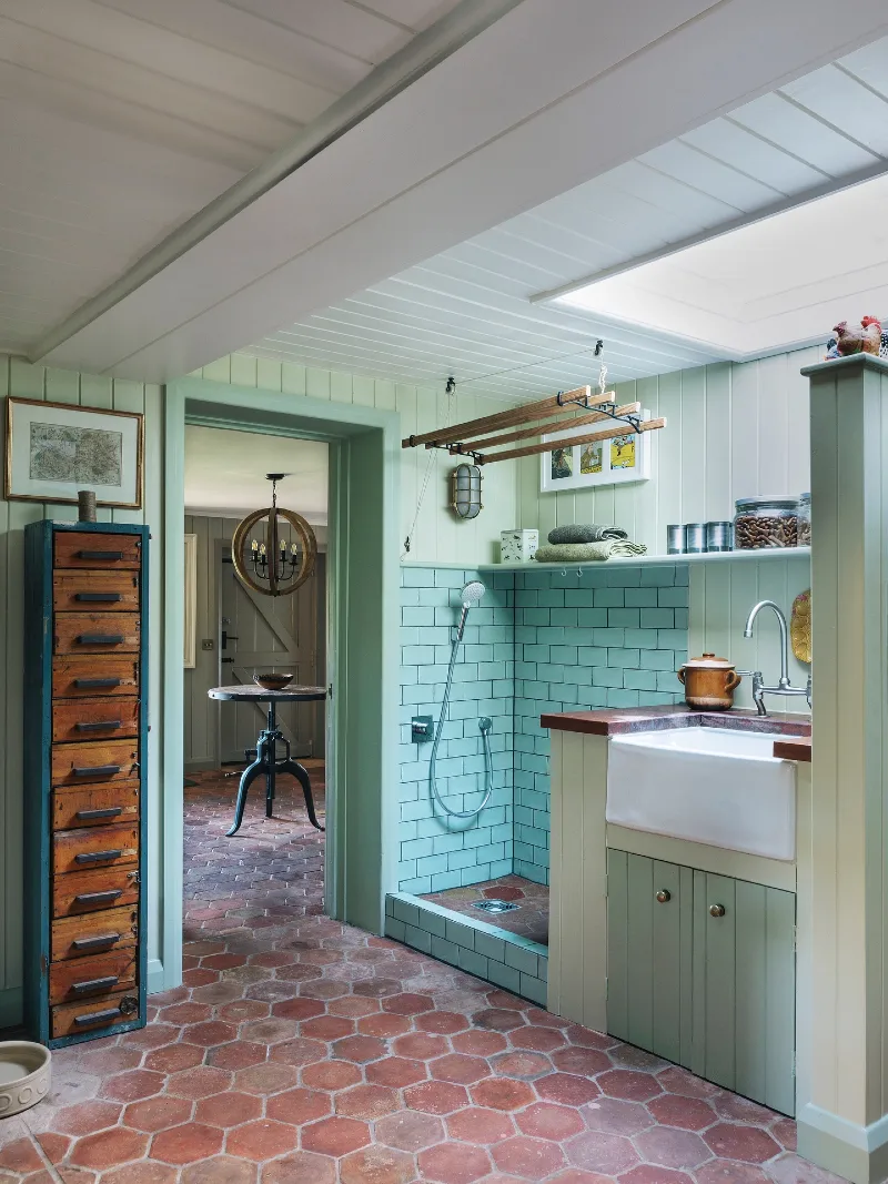Mint Green Running-Bond Shower with Hexagonal Terracotta Floors