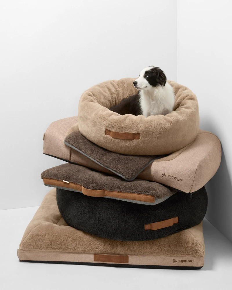 Tiered Neutral Mattresses with Round Sherpa Nest Bed
