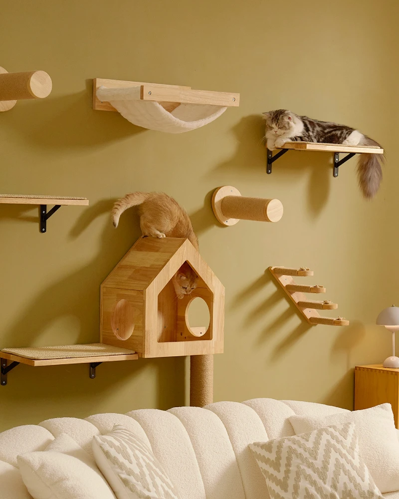 Warm-Toned Pine Cat House and Staggered Steps over a White Channel-Tufted Sofa