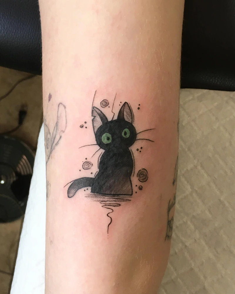 Animated Studio Ghibli Inspired Jiji Kitten on an Arm
