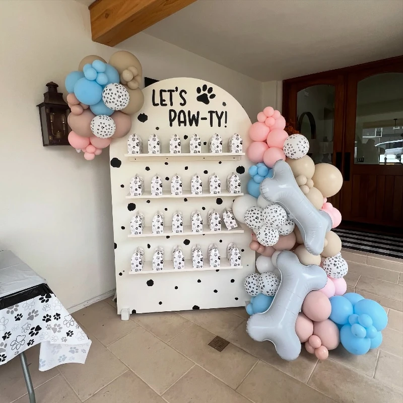 Arched Treat Wall Display with Dalmatian Print Shelves and Pastel Balloon Garlands