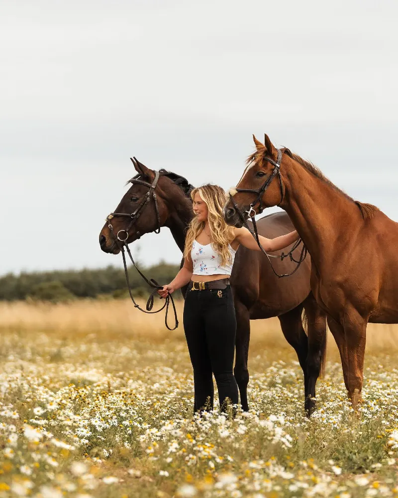 Casual Crop Top and Black Jeans in a Wildflower Meadow with Two Horses
