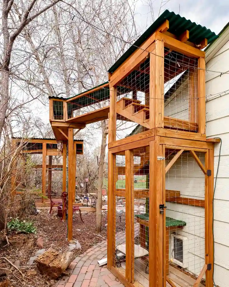 Cedar-Stained Elevated Catwalk with Green Corrugated Roofing and Twin Outlook Towers