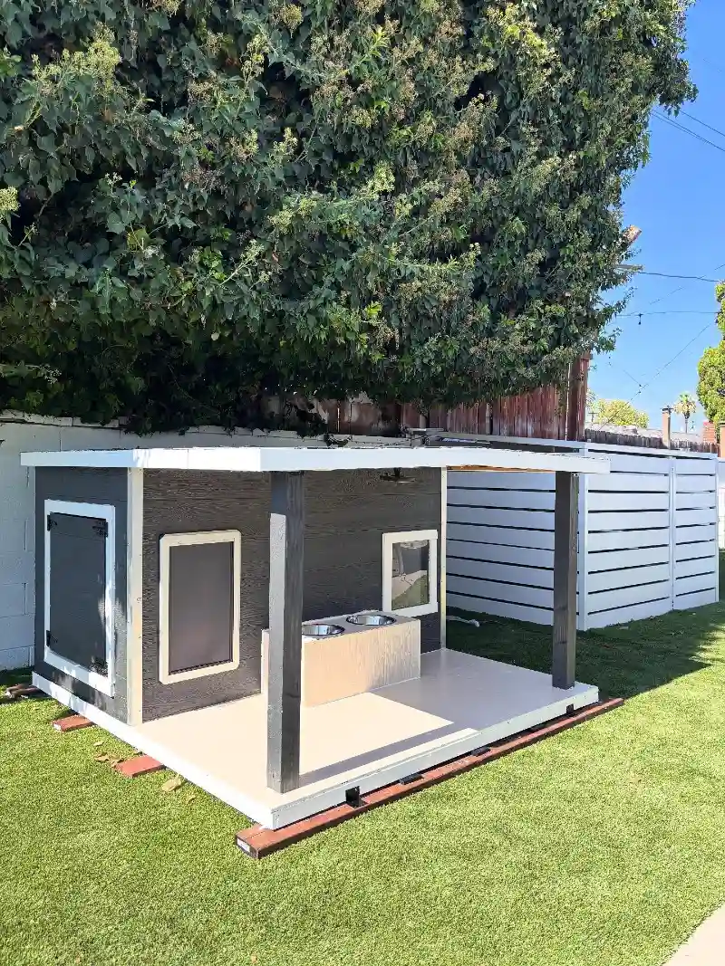 Charcoal Modern Shelter with Elevated Patio Deck and Built-In Feeding Station