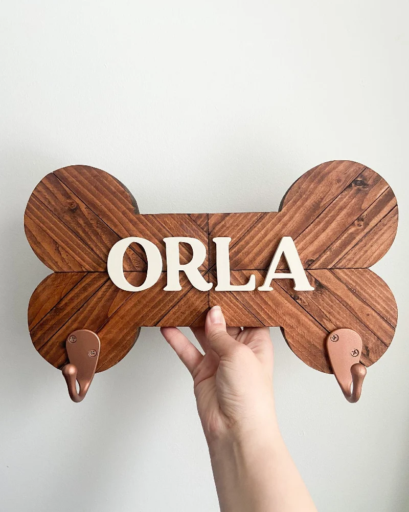 Chevron-Patterned Wooden Bone Board with Cream Typography and Rose Gold Hooks