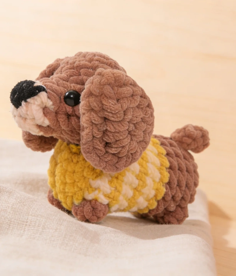 Chunky Chenille Dachshund in Patterned Yellow Sweater