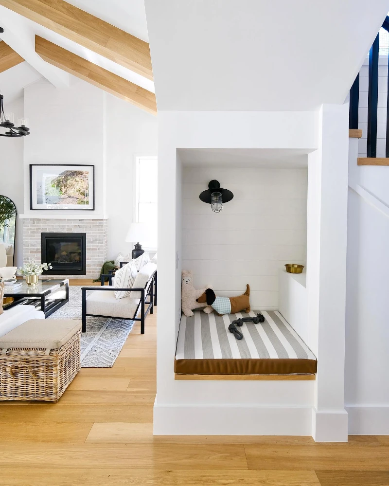 Coastal Built-In Dog Alcove with Striped Cushion and Nautical Sconce Lighting