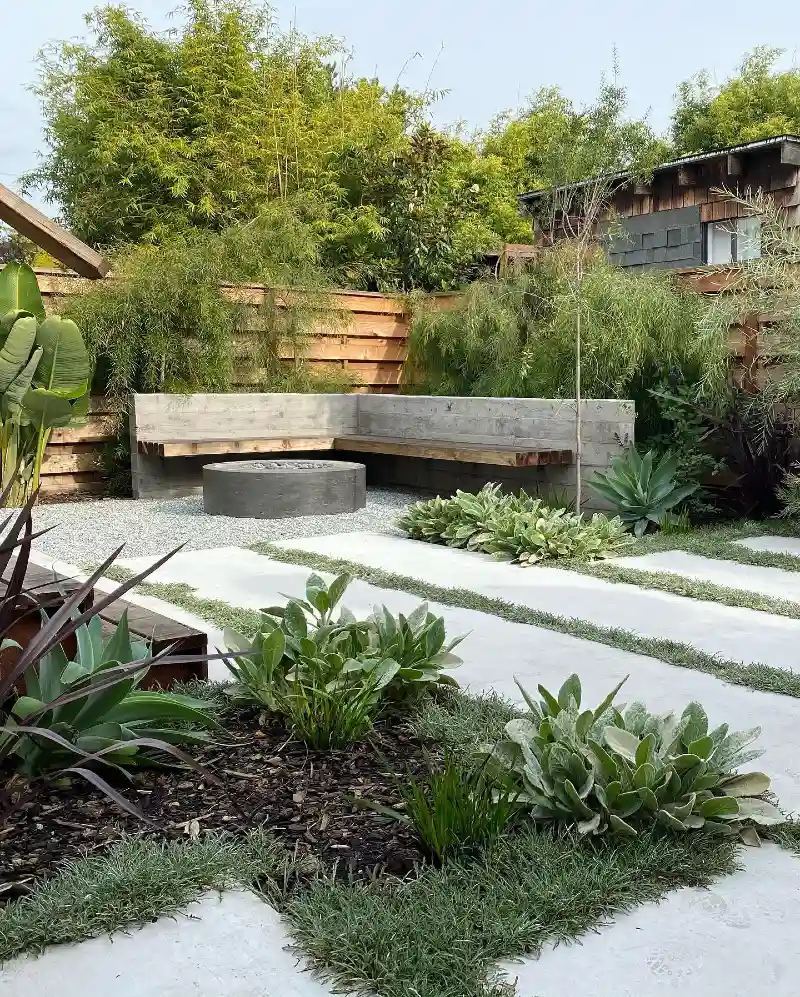 Concrete Bench Nook with Round Fire Pit and Stepping Stones