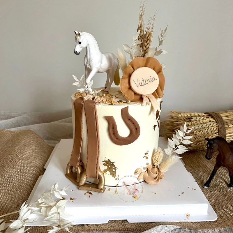 Cream Boho Cake with Stirrup Leathers, Golden Flecks, and White Stallion
