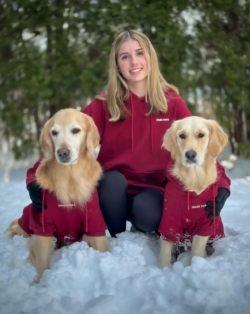Crimson Red Fleece Hoodies on a Woman and Her Two Golden Retrievers
