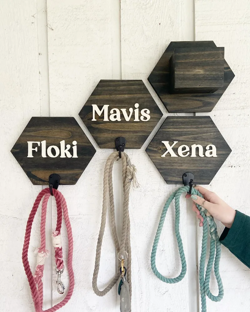 Dark Stained Hexagonal Honeycomb Tiles with White Lettering and Cotton Rope Leashes