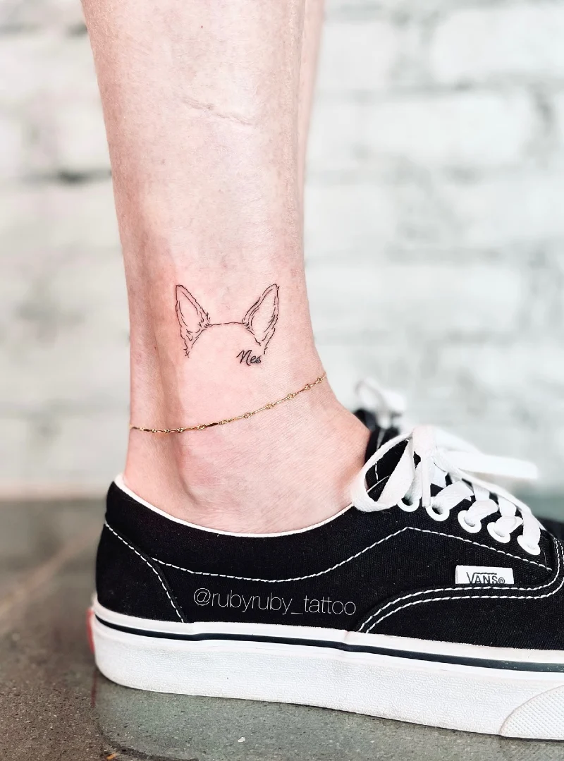 Dog ear outline with a handwritten name