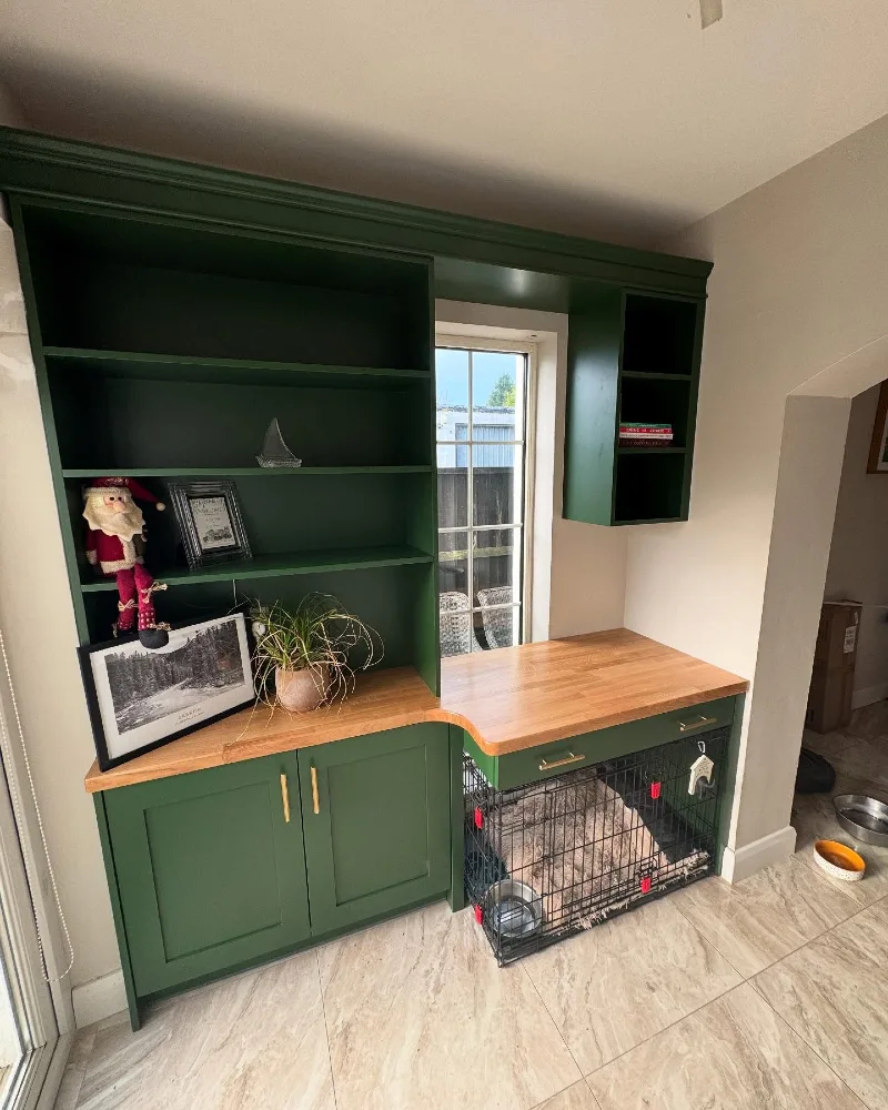 Emerald Green Built-In Office Cabinetry with Integrated Desk and Under-Counter Wire Crate