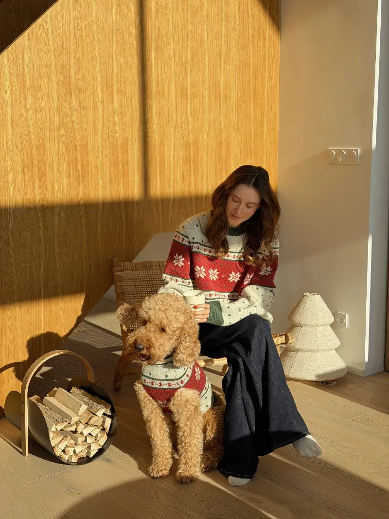Fair Isle Snowflake Knit Sweaters on a Woman and Her Fluffy Goldendoodle