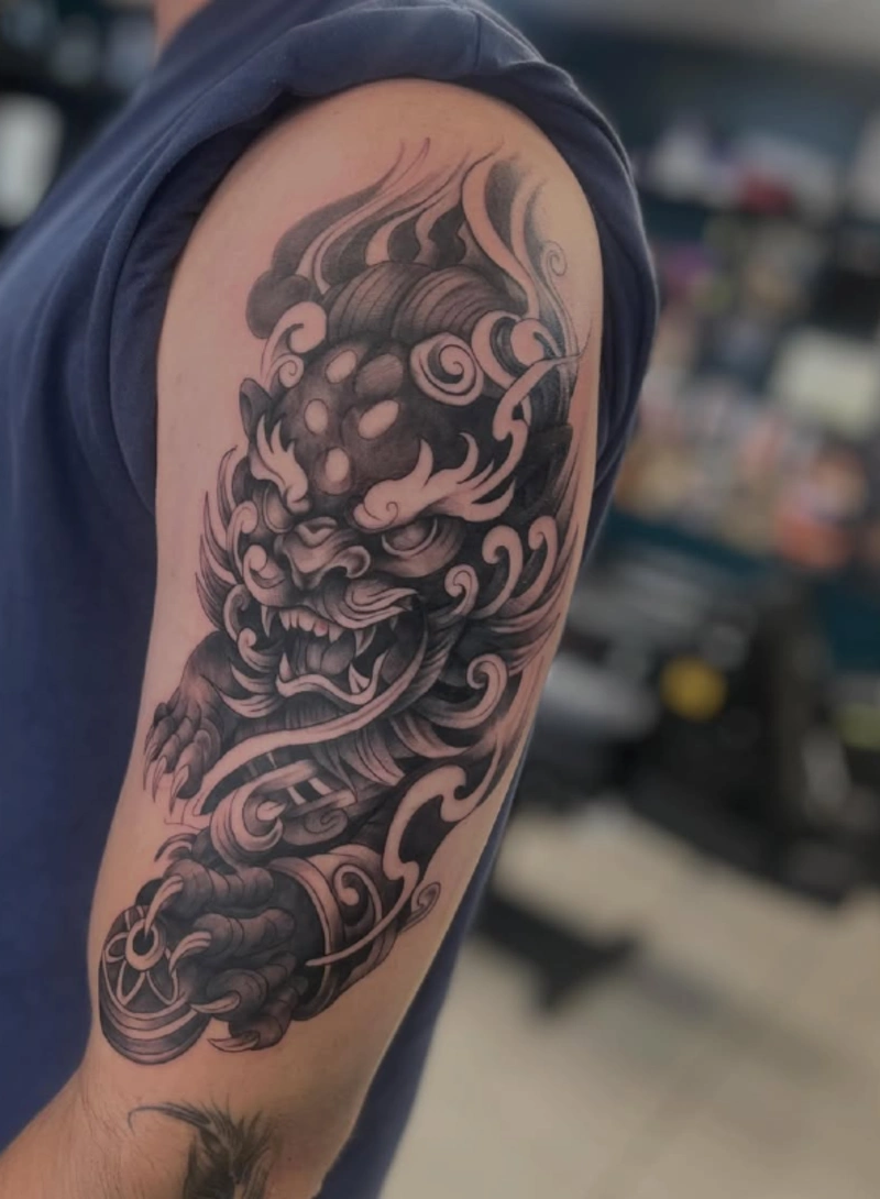 Flowing Upper Arm Foo Dog with Sacred Orb