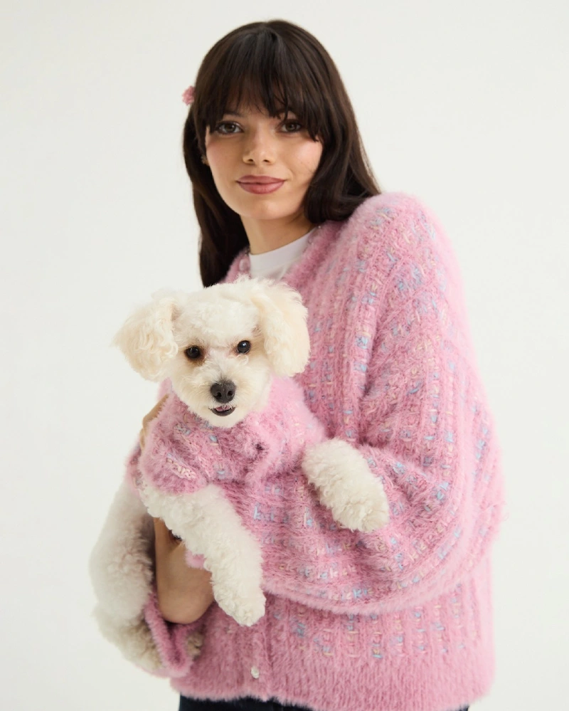 Fuzzy Bubblegum Pink Bouclé Knit Cardigans on a Woman and Her White Toy Poodle
