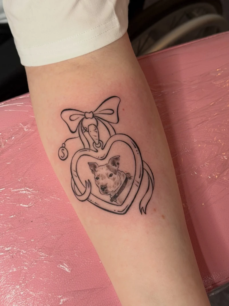 Heart shaped perfume bottle with a dog portrait