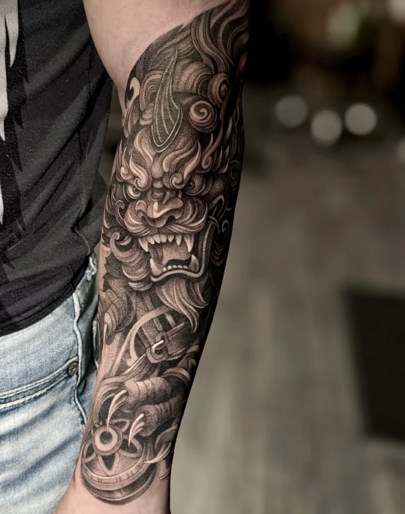 Horned Foo Dog Sleeve with Sacred Sphere on Forearm