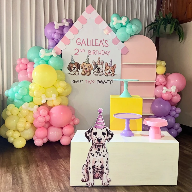 House-Shaped Portrait Backdrop with Pastel Balloon Clusters and Tiered Cake Stands
