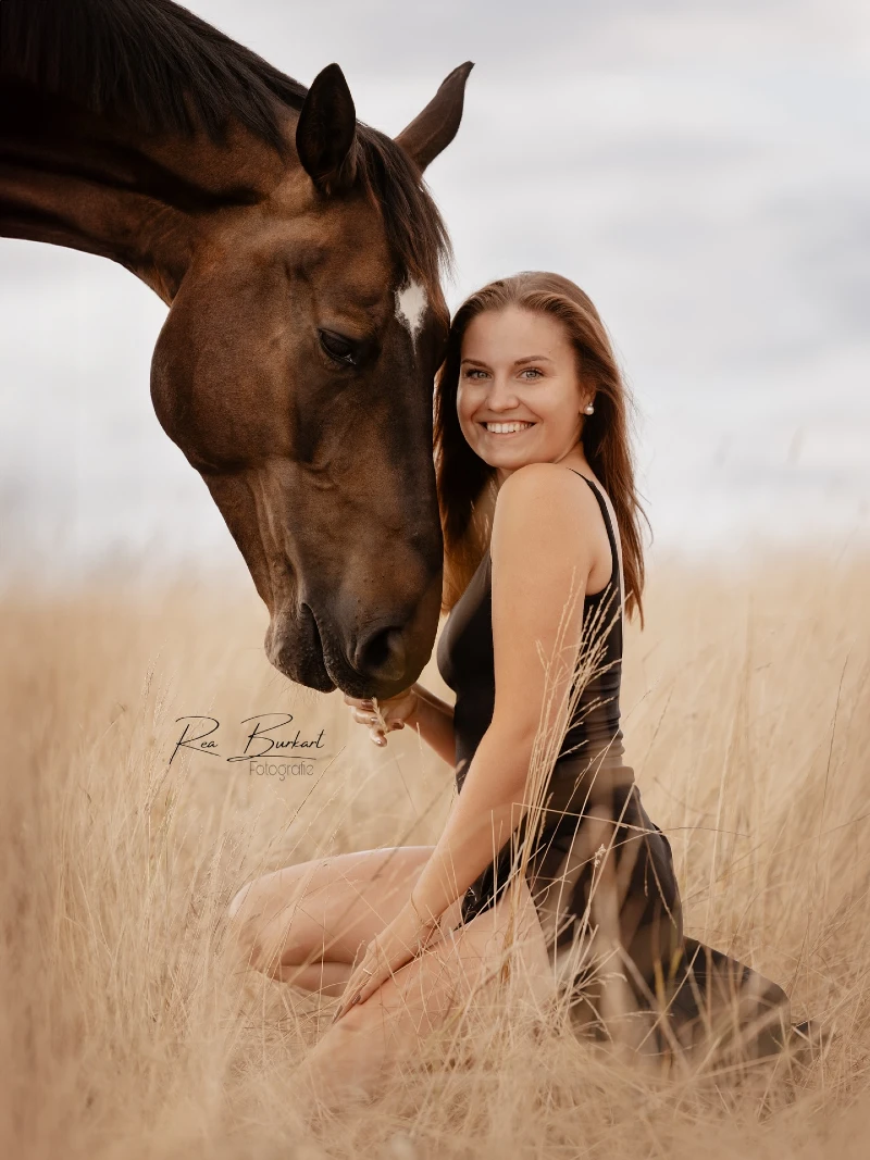 Intimate Pasture Portrait with a Bay Horse and Black Dress