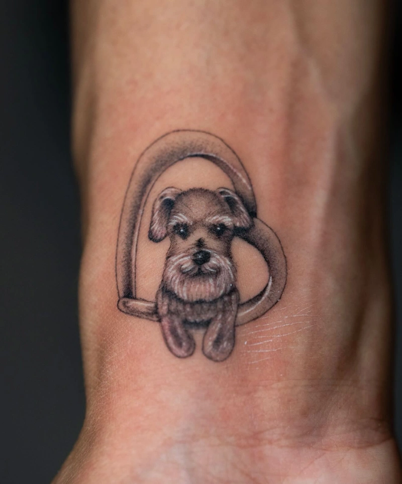 Mini dog portrait framed by a looping heart