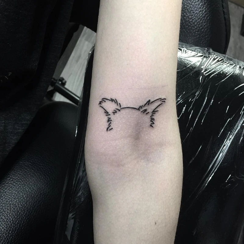 Minimalist Line-Art Fluffy Dog Ears Outline Above the Inner Elbow Crease