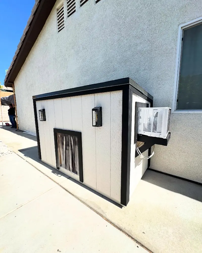 Modern White Board-and-Batten Lean-To with Matte Black Trim and Side AC Unit
