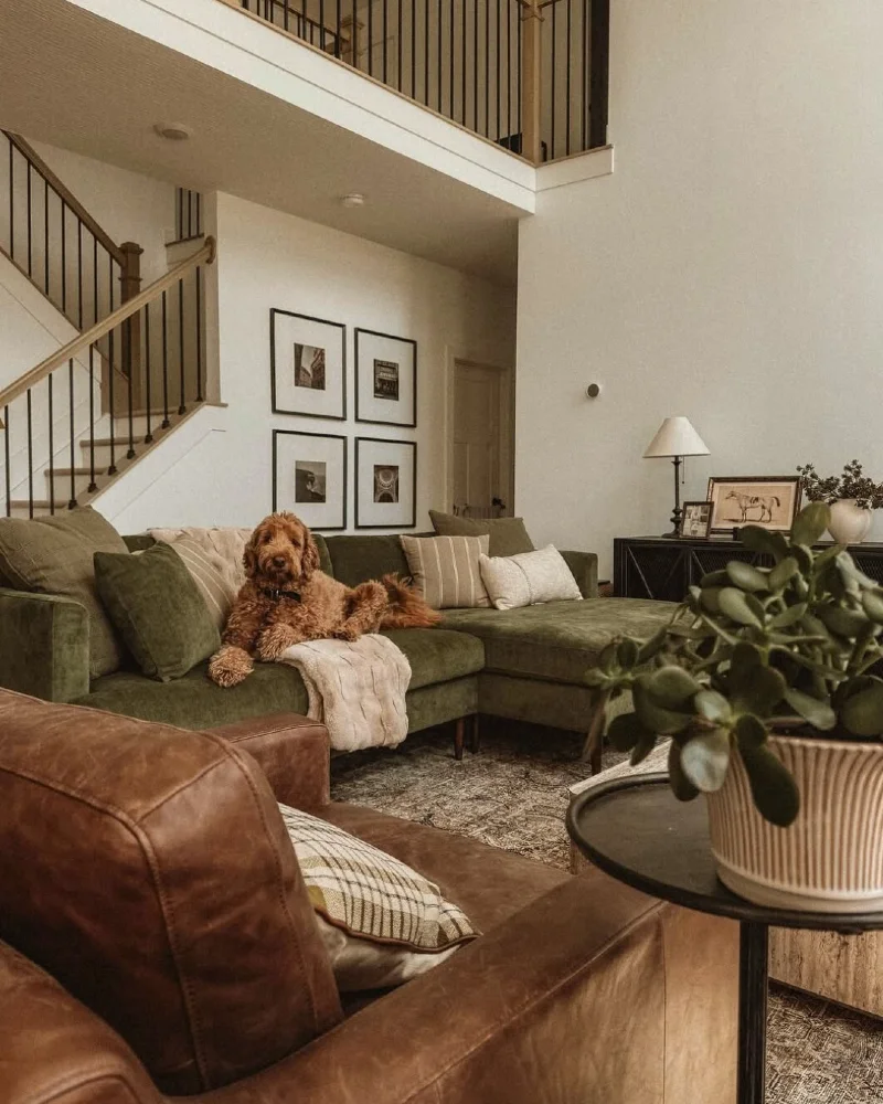Moss Green Sectional with Tan Leather Armchair and Grid Gallery Wall