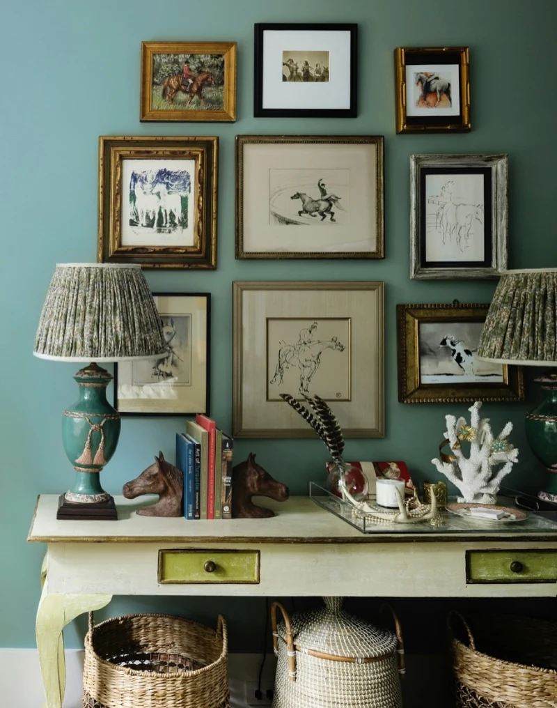 Muted Teal Gallery Wall with Eclectic Gilded Frames and Pleated Fabric Lamps