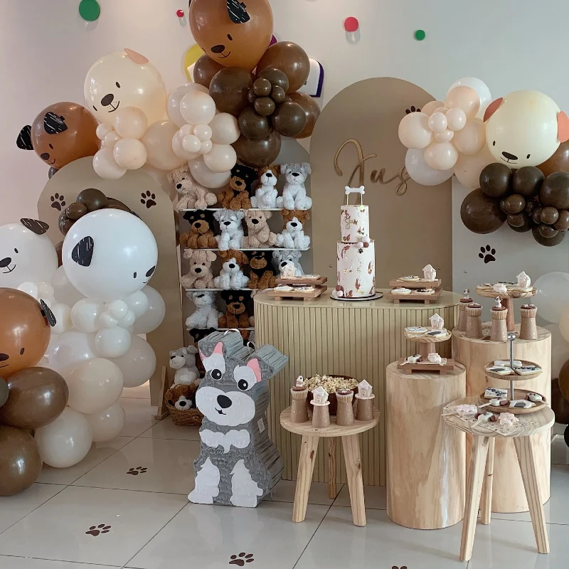 Neutral Balloon Arches and Fluted Pedestals with Plush Toy Display Shelves