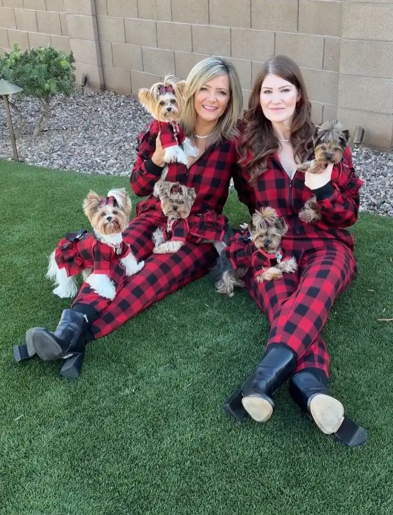 Red and Black Buffalo Plaid Jumpers on Two Women and Their Five Yorkshire Terriers