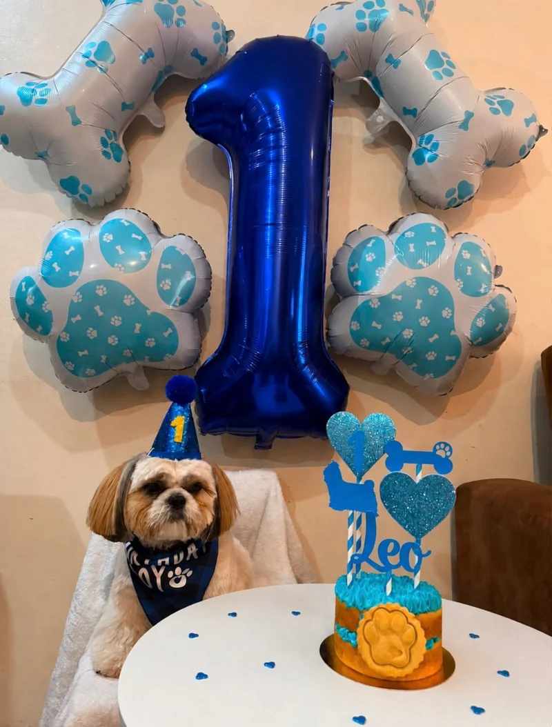 Royal Blue Foil Number One Balloon with Paw-Print Mylar Clusters and Glittering Cake Toppers