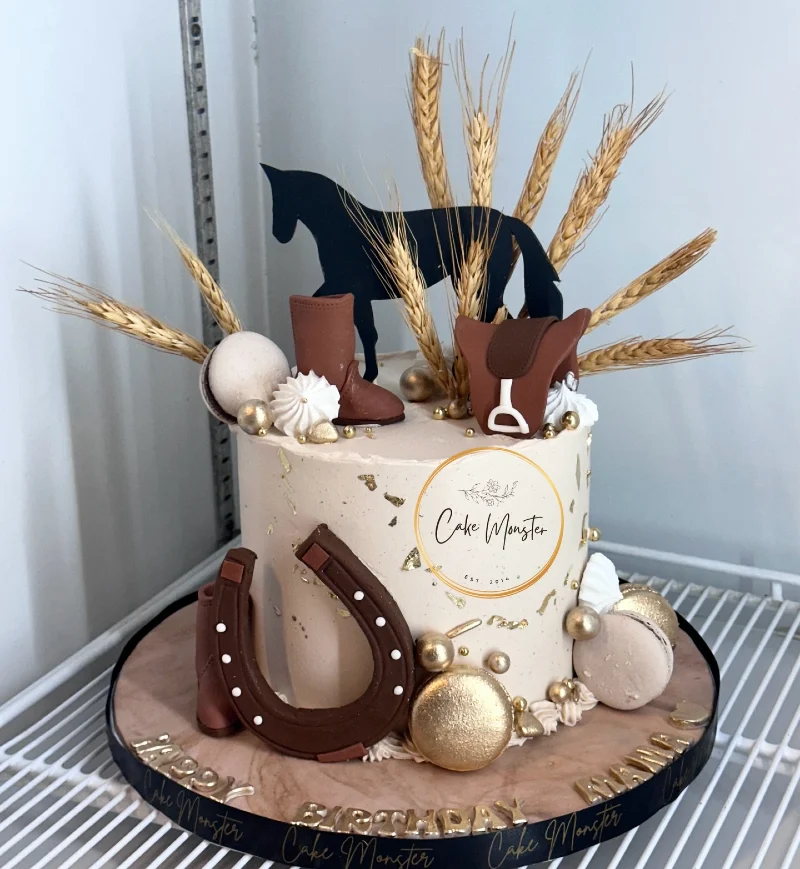 Rustic Equestrian Cake with Fondant Riding Gear and Dried Wheat Stalks