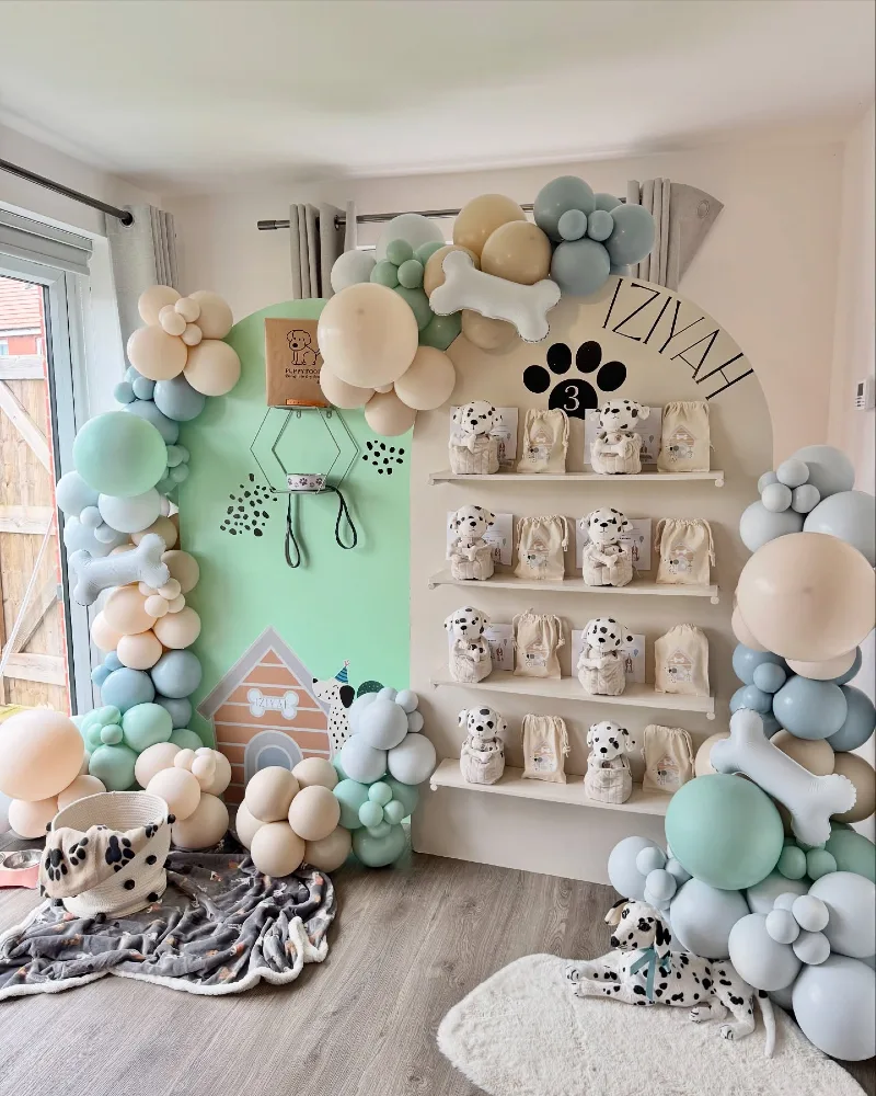 Sage and Beige Favor Shelf Display with Mint Balloon Clusters and Dalmatian Plushies