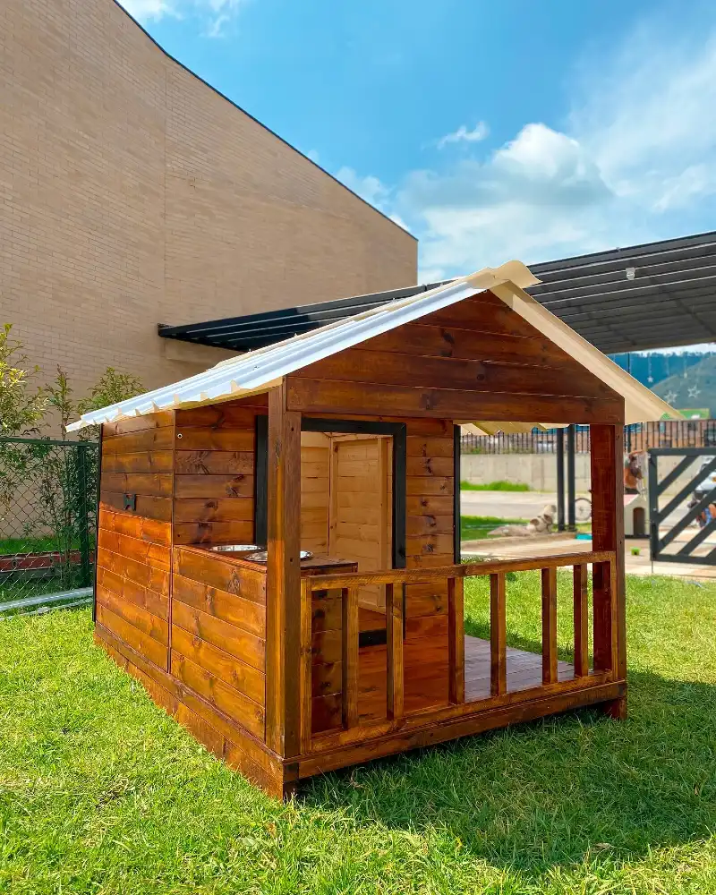 Stained Timber Cabin with Corrugated Metal Roof and Porch Railing