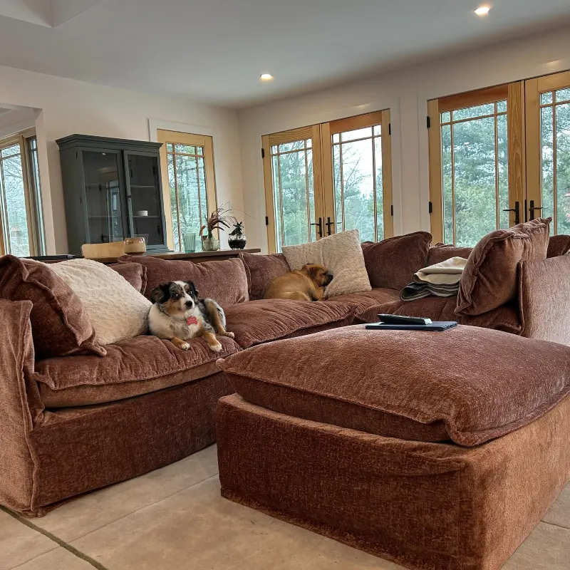 Terracotta Chenille Sectional with Oversized Ottoman and Light Wood French Doors