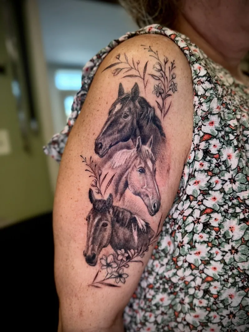 Triple Realistic Horse Portrait Half-Sleeve with Fine-Line Wildflower Accents
