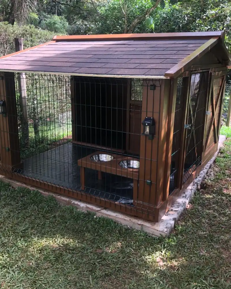 Walnut-Stained Kennel with Integrated Run and Elevated Dining Stand