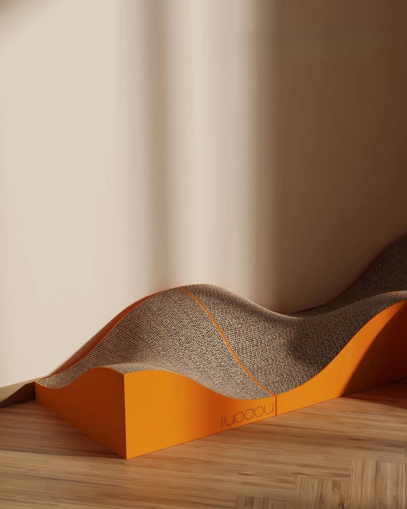 Wavy Tangerine Orange Scratching Lounge on Herringbone Wood Floor