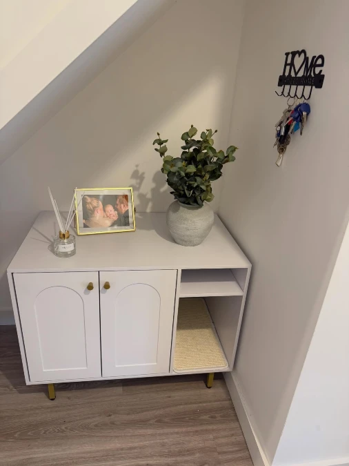 White Arched Cabinet Under Stairs
