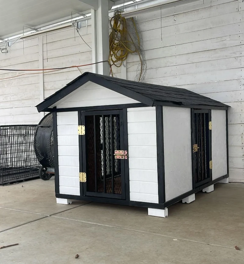 White Siding Kennel with Black Trim, Shingled Gable Roof, and Dual Heavy-Duty Security Mesh Doors