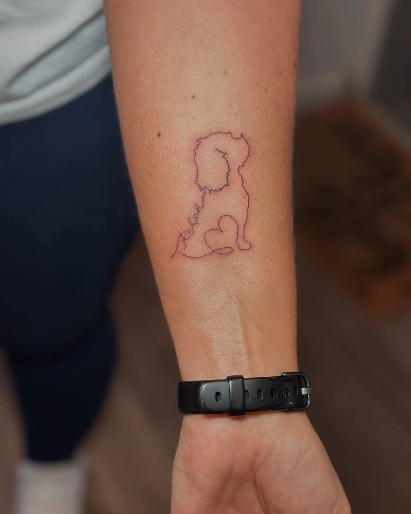dog silhouette with a heart shaped tail